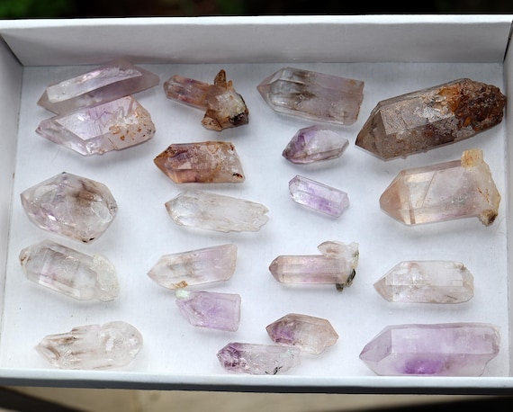 Lot of 20 Goboboseb Namibia crystals. Many are enhydros one has 3 movers. Prehnite, amethyst, hematite