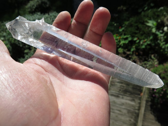 Long Beautiful Natural Colombian Quartz Lemurian crystal. 6.75 inch tall. Excellent form. Muzo Colombia. Scarce crystal at this length.