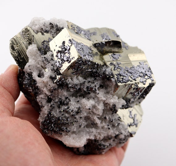 A fine Pyrite with quartz and epitaxial galena crystals. Huanzala mine, Huallanca, Bolognesi Prov., Ancash, Peru. 4.25 inch. Lustrous. 2 lb