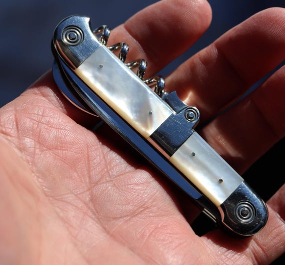 Unused salesman sample pearl Champagne knife. Mint. 1880’s, F. Herder, Germany. Completely original