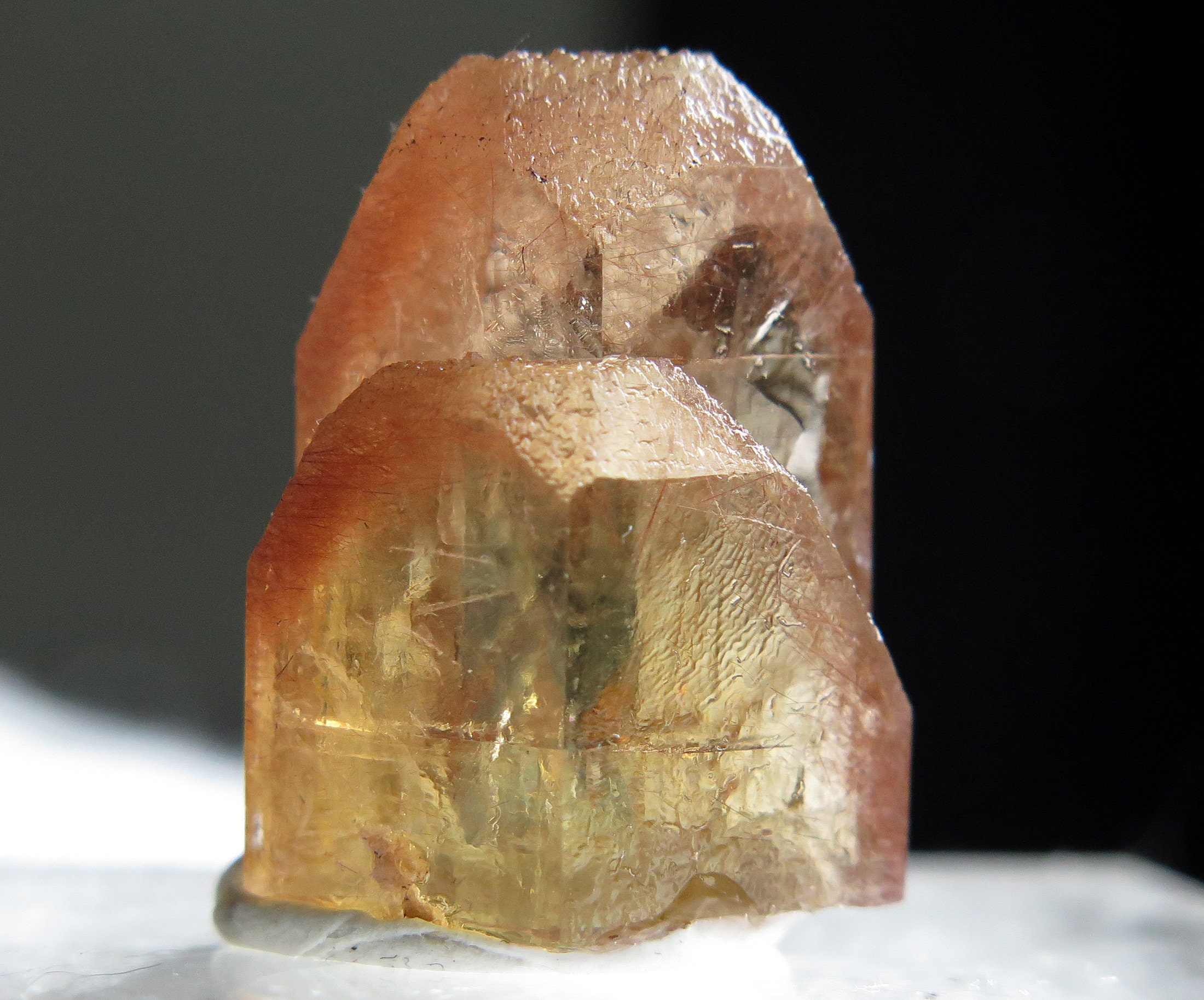 Gem Golden Topaz twin crystal with hematite inclusions allowing a