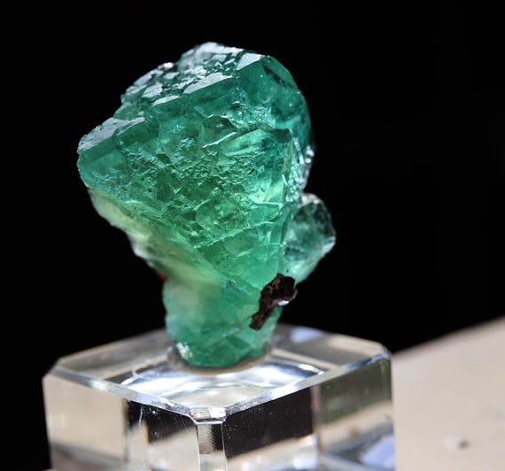 Octahedral Fluorite with Pyrite. Lustrous gemmy floater. Milpo Mine, Pasco, Peru. Self standing