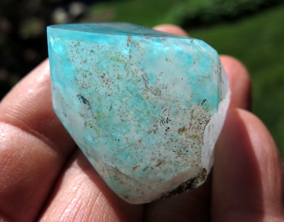 Ajoite polished point with crystallized natural bottom. Great saturation of blue Ajoite with phantom and inclusions. 40.3 grams Messina SA