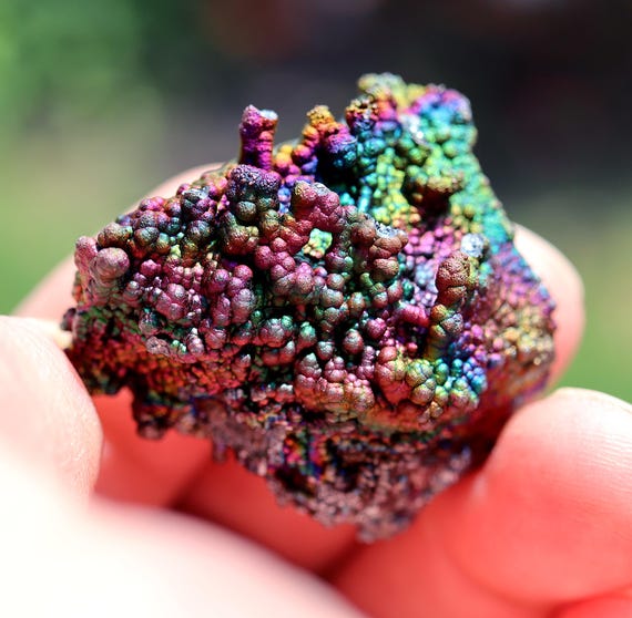 Top rainbow Iridescent Hematite, Goethite, Turgite on Quartz. Graves Mt., Georgia USA