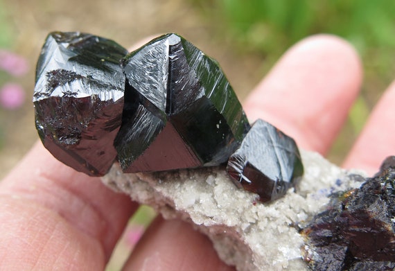 Well formed large Sphalerite crystals on matrix. Gordonsville mine, Smith Co., Tennessee, USA. Mounted on stand included.