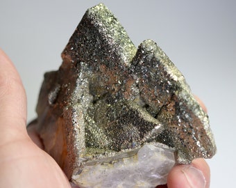 Epitaxial metallic Pyrite covering Barite blades. Small find 2002, Taouz, Morocco. 3.75 inch across. Stands upright