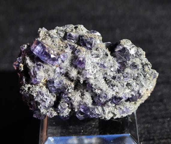 Purple "Tanzanite" Fluorite cluster on Sparkling Quartz and Pyrite. Xiayang Mine, Xiayang city, Yongchun Co., Quanzhou, Fujian, China