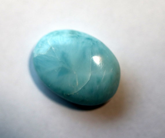 Rich color little Larimar cab. Filipinas mine, Barahona Province, Dominican Republic. 12.3 carats