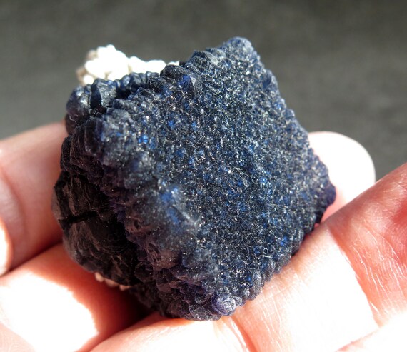 Fluorite Blue cube. Interesting surface formation. Huanggang deposit, Inner Mongolia, China 64.4 grams. 1.25 inch across