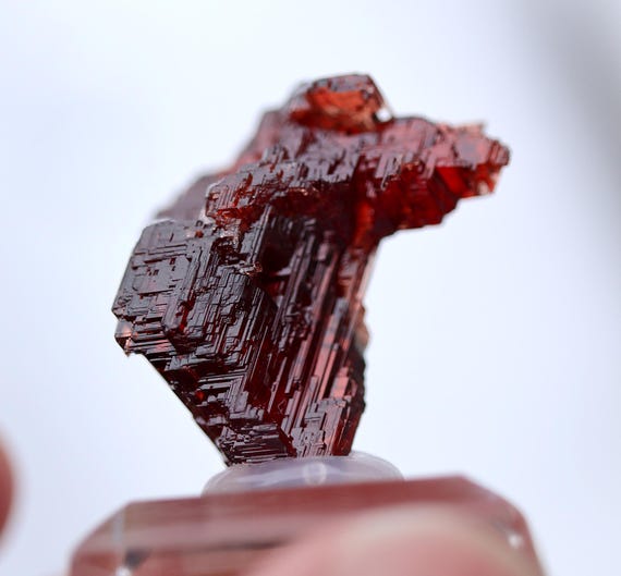 Naturally etched Lustrous Spessartine Garnet Navegadora mine, Brazil. A red hot coal of a gem.