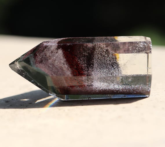 Hand polished Garden Quartz, or Lodolite Quartz crystal. Hematite and Chlorite included. Open phantom