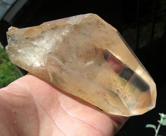 Large doubly terminated Tangerine Quartz. MG Brazil. 1 pound 6.5 ounce. 5.5 inch tall. Point tip is perfect