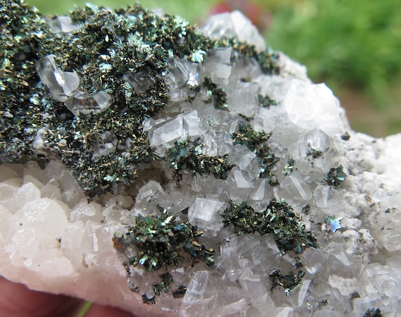 Iridescent Marcasite on and in Calcite. Linwood mine, Buffalo, Scott County, Iowa USA. 4.5 inch long