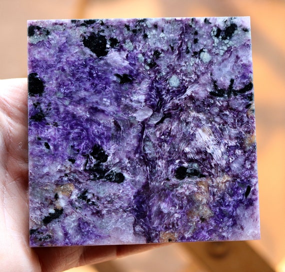 Quality Charoite slab with polished face. Murunskii Massif, Chara and Tokko Rivers Confluence, Aldan Shield, Russia. 4 inches