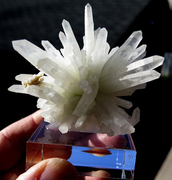 Offering a Quartz Flower mounted on a thick Lucite block. Mined in Kosovo