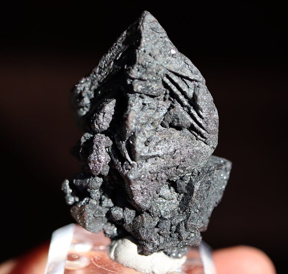 Sparkling Hematite pseudomorph after cubic Magnetite crystal. Patagonia, Argentina. 77 grams.