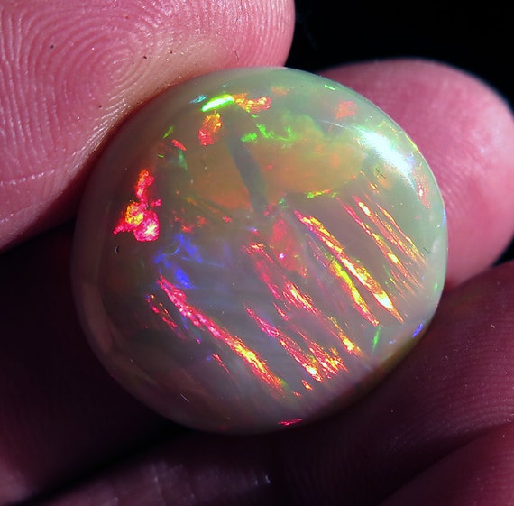 One High flash Polished Wolo Opal. Ethiopia. 21 Carats