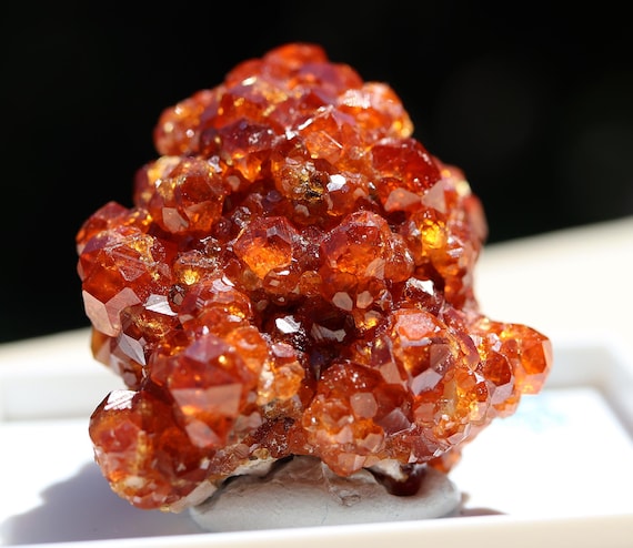 Garnet Var. Spessartine on Microcline. Tongbei, Yunxiao, Fujian Prov., China. 4.1 cm. Bright no damage Perfection. Ex. Phillip Phillips