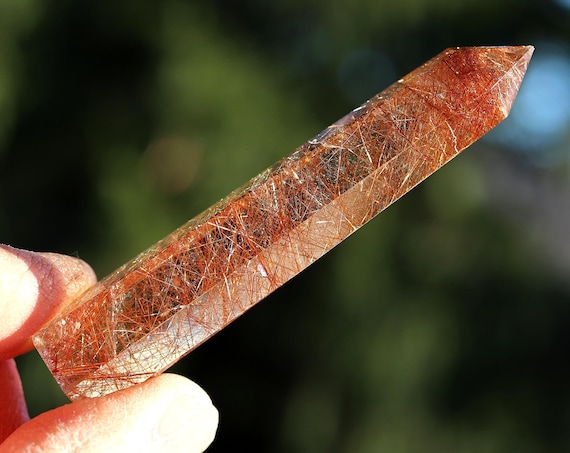 Copper color included Rutile Quartz crystal. No damage. Mined 2004 at Bahia, Brazil. 3.5 inch tall