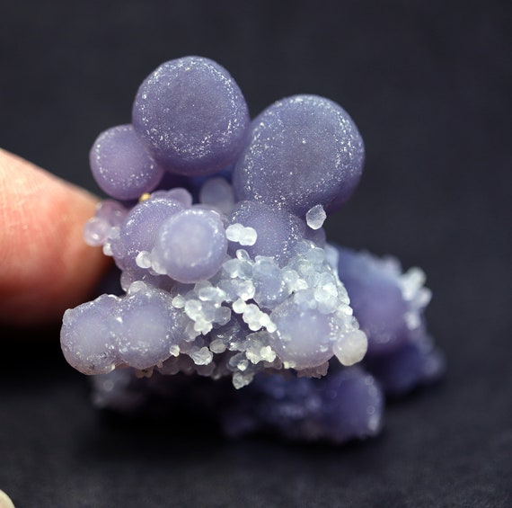 Unique. Largest spheres we have seen. Grape Amethyst crystal cluster. This is a floater. Sulawesi Islands, Indonesia.