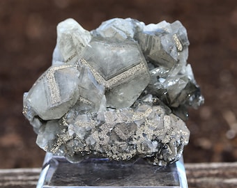 Benz growth Pyrite on shallow scalenohedron calcite crystals. Daye County, Hubei Province, China. Presents perfectly.