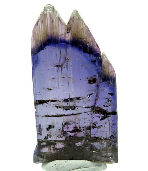 Natural gem Tanzanite 29.5 grams. Merelani in northern Tanzania. Intense pleochroism in polarized light