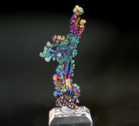 Complete rainbow Hematite stalactite floater. All sides have rainbow. No dead areas. 2.75 inch tall. Mined Graves Mt., Georgia USA