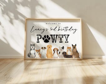 May include: A welcome sign for a dog-themed birthday party. The sign is white with black text that reads "Welcome to Laney's 3rd Birthday Pawty". There are illustrations of various dog breeds in a row below the text.