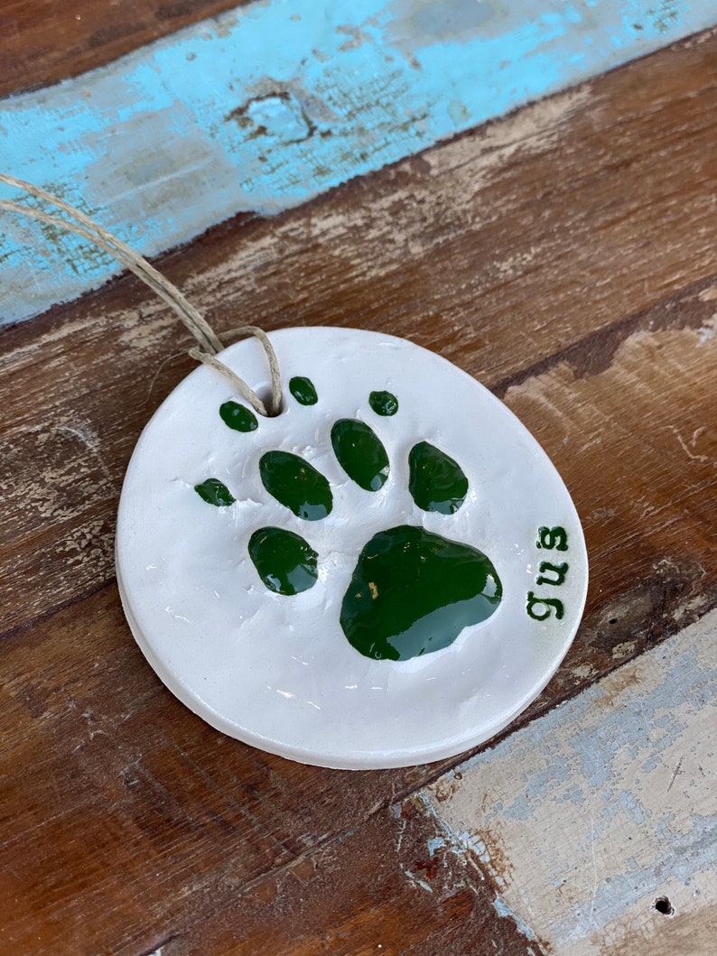 Pet Paw Print ornament in ceramic in holly green image 1