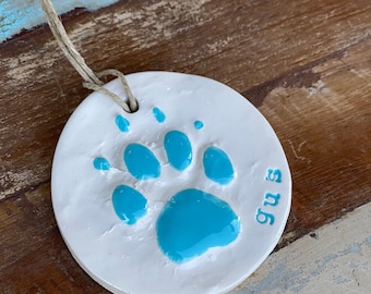 Pet paw print ornament in ceramic In Aqua blue