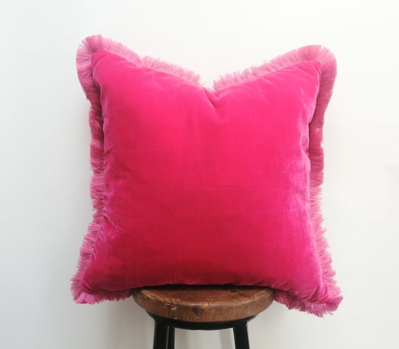 Bright pink velvet pillow deals
