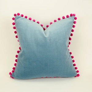 blue velvet pom pom pillow // pink pom pom cushion // blue and pink pillow