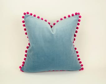 blue velvet pom pom pillow // pink pom pom cushion // blue and pink pillow