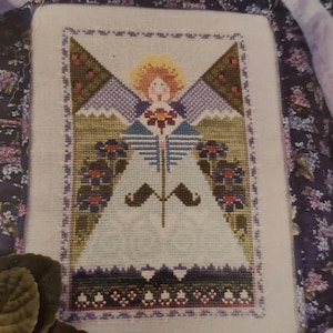 In the Garden cross stitch leaflet number 181 design by Vicki Hastings the Cricket Collection The Cross Eyed Cricket