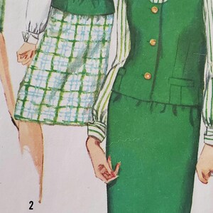 May include: A vintage sewing pattern featuring two women wearing green and white outfits. The woman on the left is wearing a green vest with a white blouse and a plaid skirt. The woman on the right is wearing a green vest with a white and green striped blouse and a green skirt. The pattern includes the numbers "1" and "2" printed on the page.
