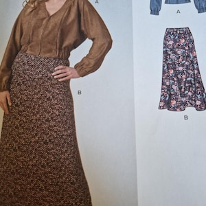 Könnte beinhalten: Eine Schnittmuster-Illustration mit einem braunen Langarm-Oberteil mit V-Ausschnitt und einem strukturierten braunen Rock. Das Muster enthält eine blaue Jacke im Jeans-Stil mit der Kennzeichnung A und einen dunklen Rock mit Blumenmuster, gekennzeichnet als B.