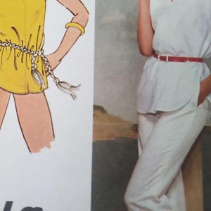 May include: Illustration of two women modeling clothing. One wears a yellow tunic with a braided belt, the other a white tunic and pants with a red belt. The Jiffy logo is visible.