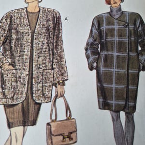 May include: A Very Vogue sewing pattern envelope featuring two illustrations of outerwear. The left shows a textured, multi-colored tweed jacket with patch pockets. The right shows a dark olive green coat with a blue plaid pattern and a single button.