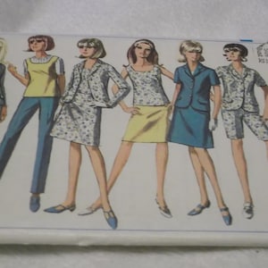 May include: A vintage Simplicity sewing pattern for women's clothing. The pattern is for a jacket, skirt, trousers, and shorts. The pattern is for sizes 12 and 14. The pattern number is 7019.