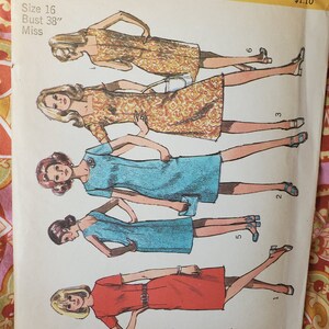 May include: A vintage Simplicity sewing pattern for a dress, size 16, bust 38 inches. The pattern shows five different styles of dresses, including a red dress, a blue dress, and a yellow floral dress.