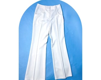 May include: White wide-leg trousers with a high waist and pockets. The trousers are made of a smooth, lightweight fabric.