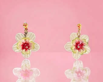 Flower earrings with layered Acrylic flower beads. A Vintage Nomad Designs exclusive creation Vintage and newer beads used