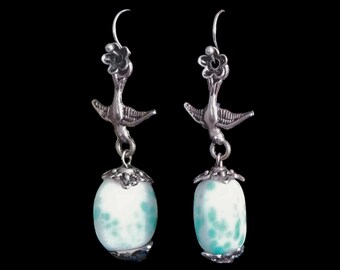 Diving Sparrow Earrings lampwork glass beads in silver tone.