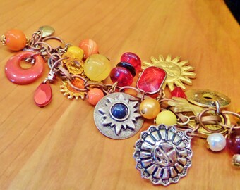 Sun charm bracelet warm tones Upcycled charm bracelet.