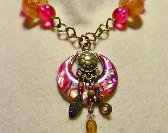 Upcycled Turtle and Abalone Necklace.