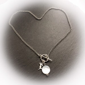 Freyja Full Moon Necklace. Tibetan Silver Hares and Tahitian Black Lip Oyster Shell "Moon". Front Fastening "Moons" Clasp. Custom Length.