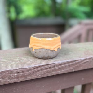 Orange drippy cup