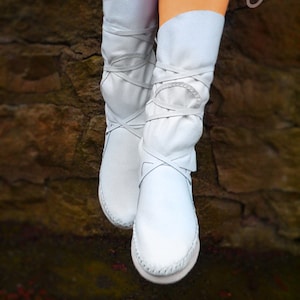 White moccasins boots on sale