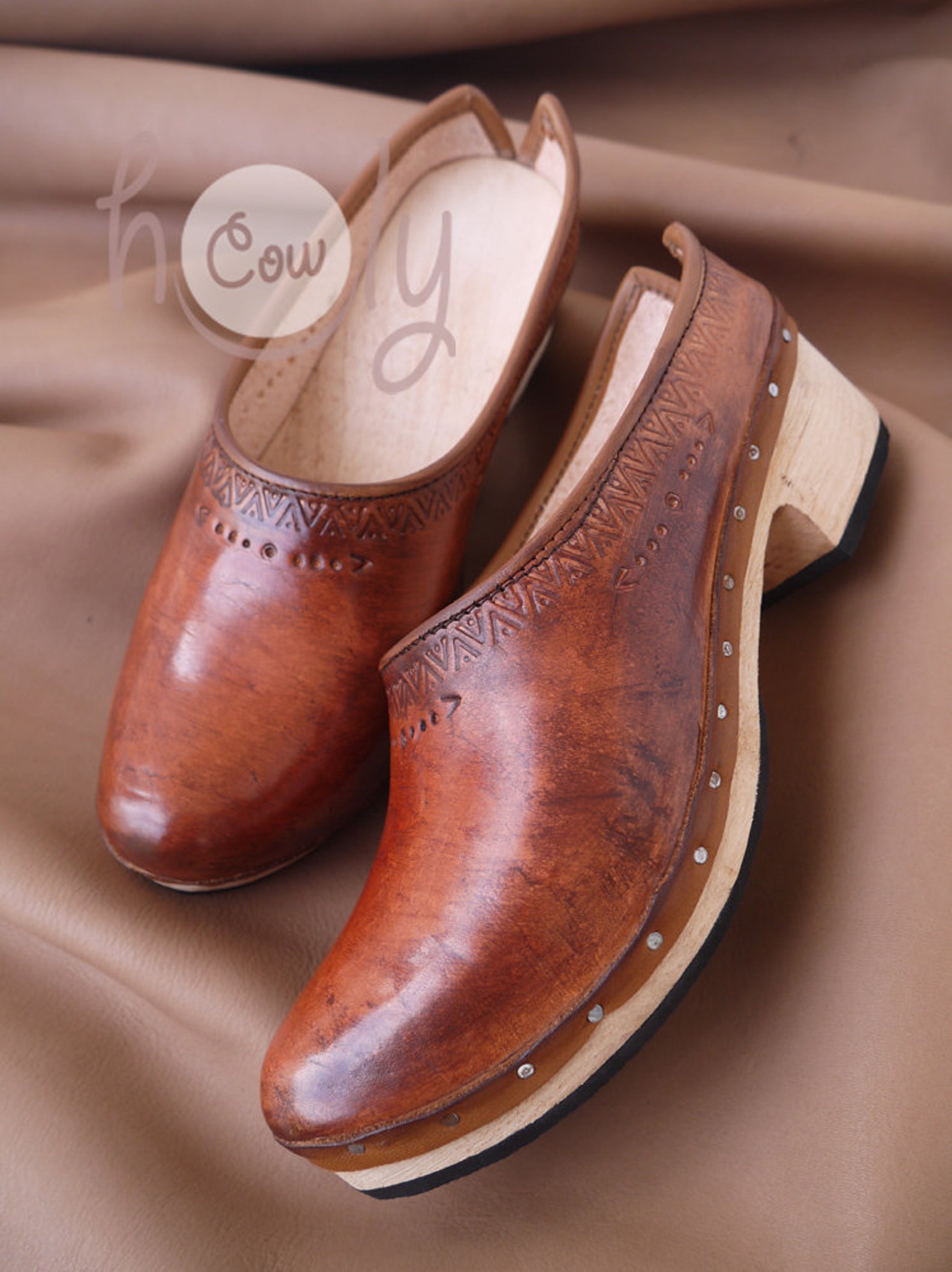 leather clogs with strap