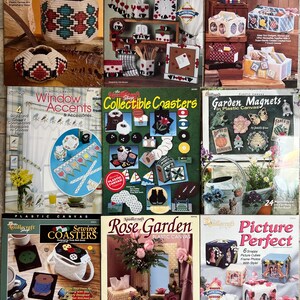 May include: A collection of vintage plastic canvas pattern books. Titles include "Indian Pottery," "Hog Heaven," "Handy Organizers," "Window Accents," "Collectible Coasters," "Garden Magnets," "Sewing Coasters," "Rose Garden," and "Picture Perfect."
